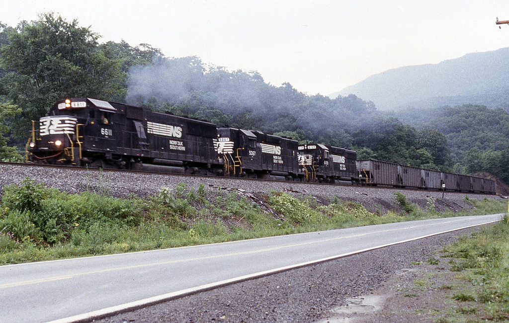 Classic power pulling an empty coal train